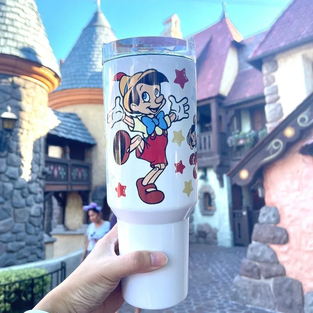 Disney Pinocchio 40 oz Tumbler/Water bottle/Mug with hand carry handle. FEATURE